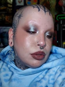photo of customer wearing earrings