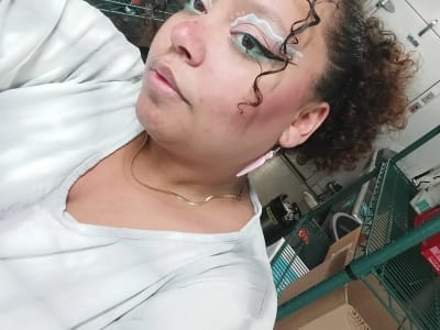 photo of customer wearing earrings