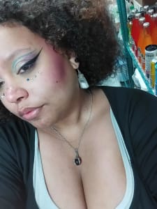 photo of customer wearing earrings
