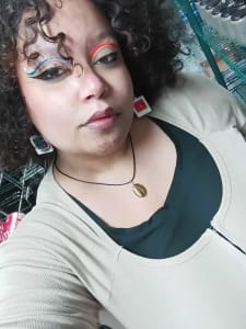 photo of customer wearing earrings