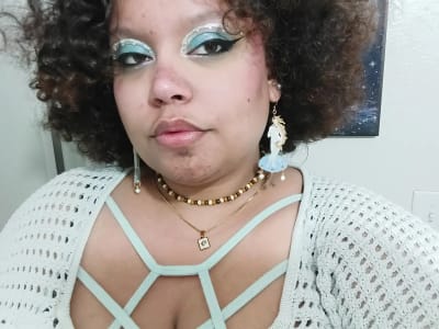photo of customer wearing earrings