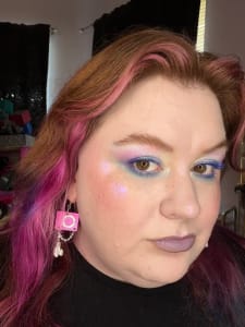 photo of customer wearing earrings
