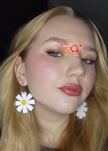 photo of customer wearing earrings
