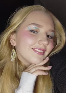 photo of customer wearing earrings