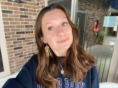photo of customer wearing earrings