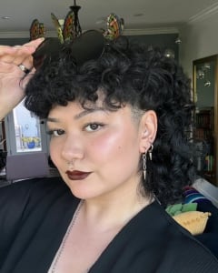 photo of customer wearing earrings