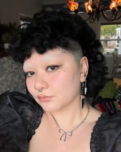 photo of customer wearing earrings