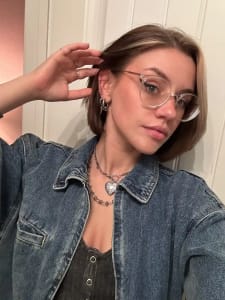 photo of customer wearing earrings
