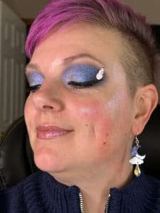 photo of customer wearing earrings