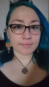 photo of customer wearing earrings