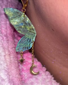 photo of customer wearing earrings