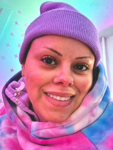 photo of customer wearing earrings