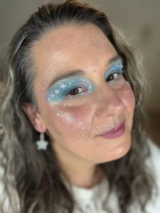 photo of customer wearing earrings