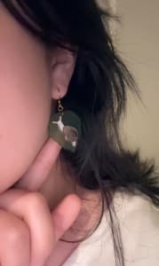 photo of customer wearing earrings