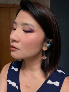 photo of customer wearing earrings