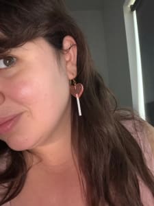 photo of customer wearing earrings