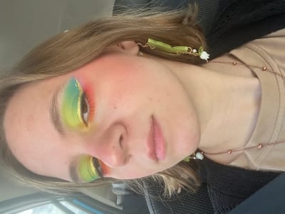 photo of customer wearing earrings