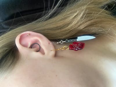 photo of customer wearing earrings