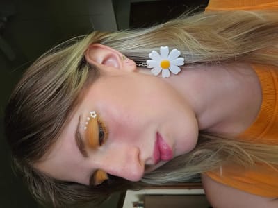 photo of customer wearing earrings
