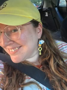 photo of customer wearing earrings