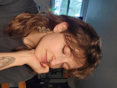 photo of customer wearing earrings