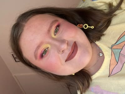 photo of customer wearing earrings