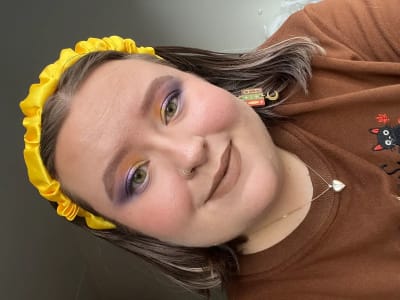 photo of customer wearing earrings