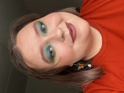 photo of customer wearing earrings