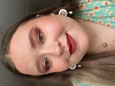 photo of customer wearing earrings