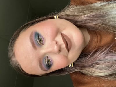 photo of customer wearing earrings