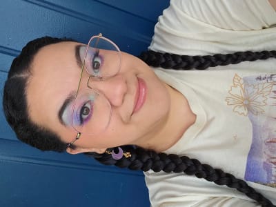 photo of customer wearing earrings