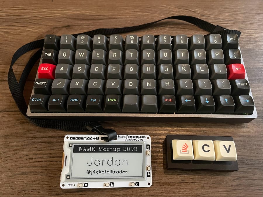 Preonic mechanical keyboard, StackOverflow macropad, and a Badger2040 used as a digital lanyard.