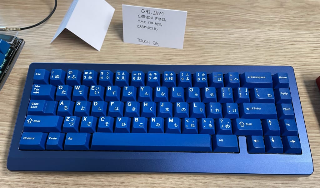 Blue GHS.JEM custom mechanical keyboard with blue GMK striker keycaps