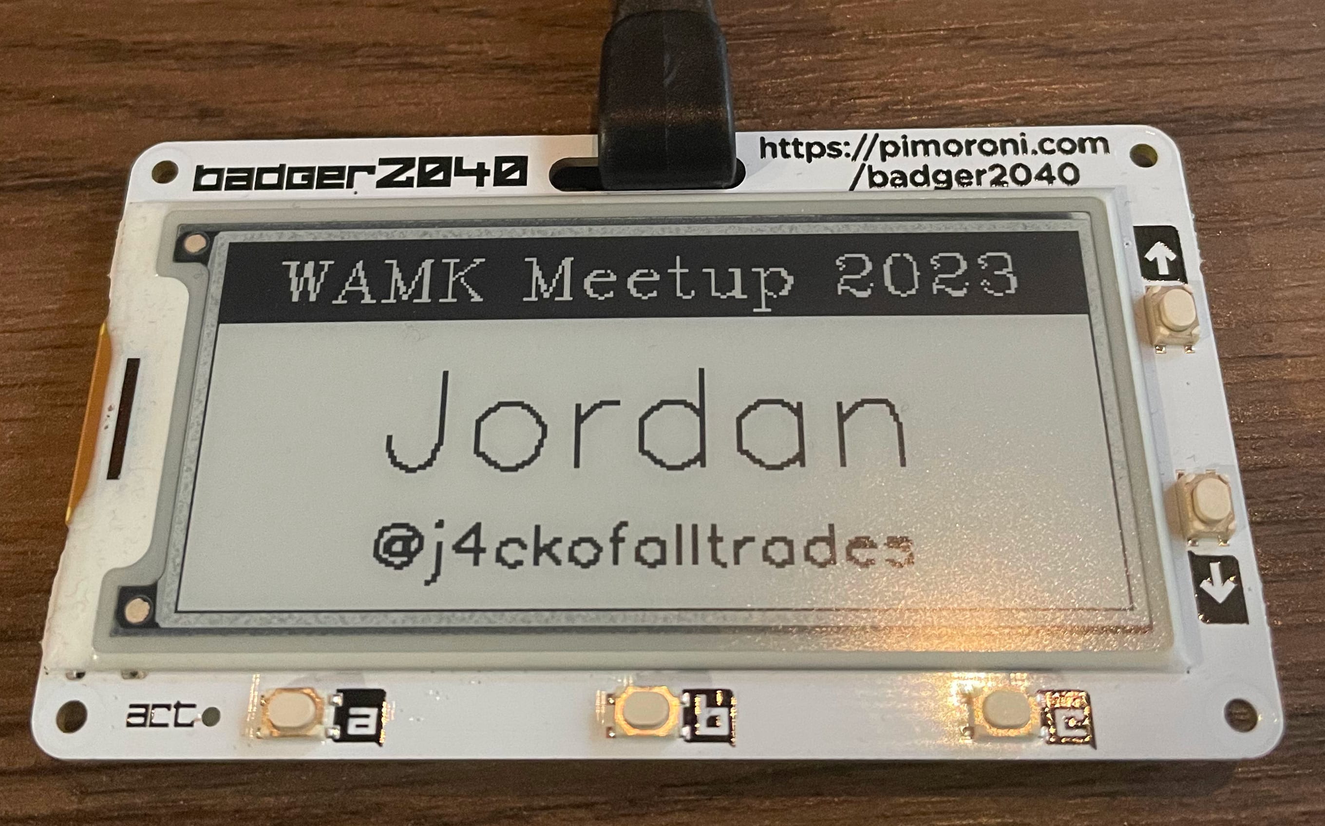 Badger2040 with the header text WAMK Meetup 2023 and the attendee's name