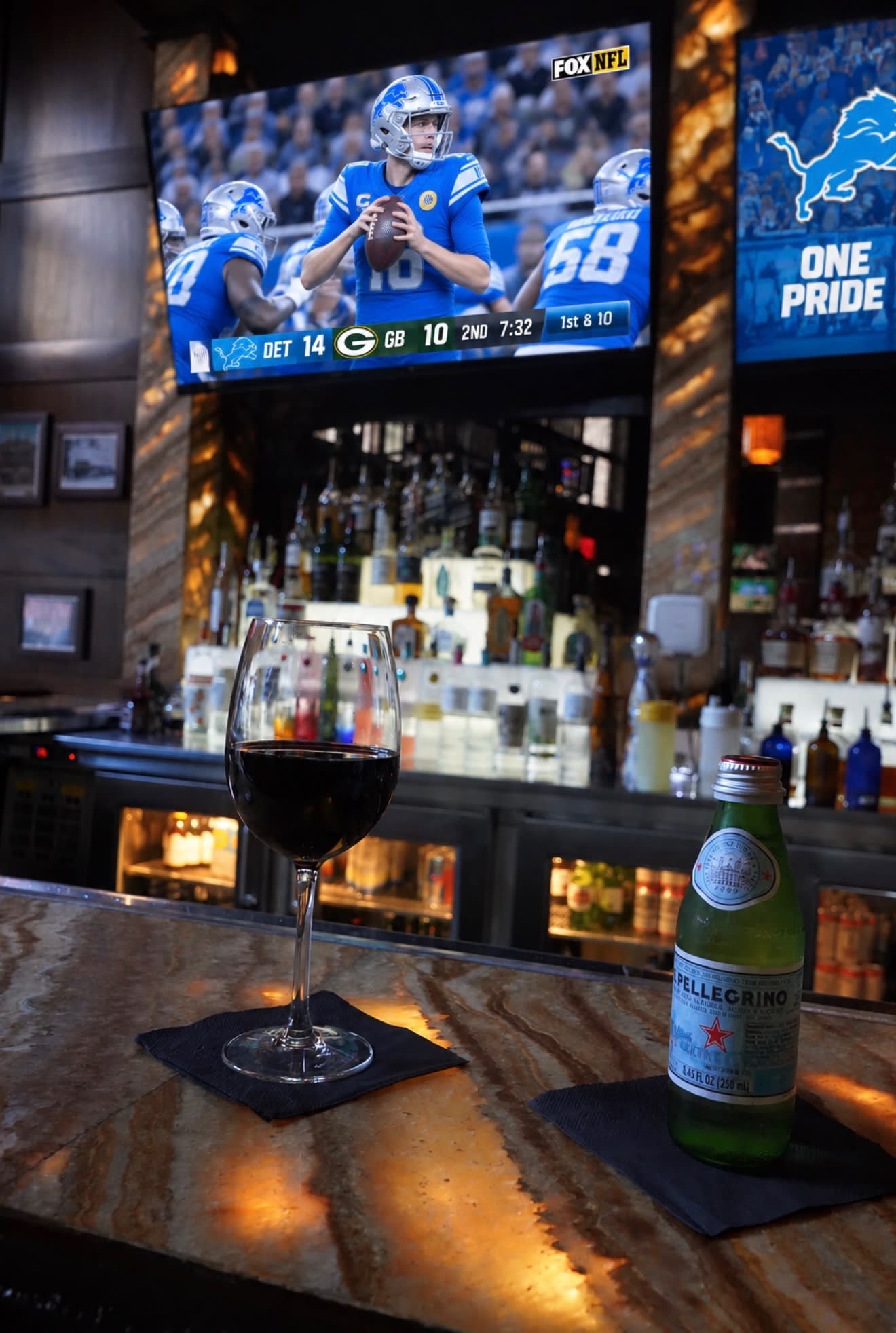 Lions game on the screens over Louie's back bar