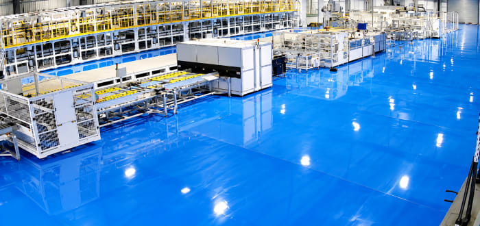 High-Tech Factory Line on Glossy Blue Floors