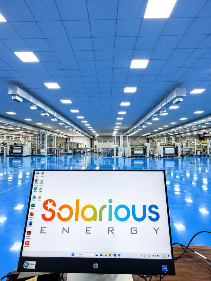 Solarious Energy_ Modern Factory Aisle