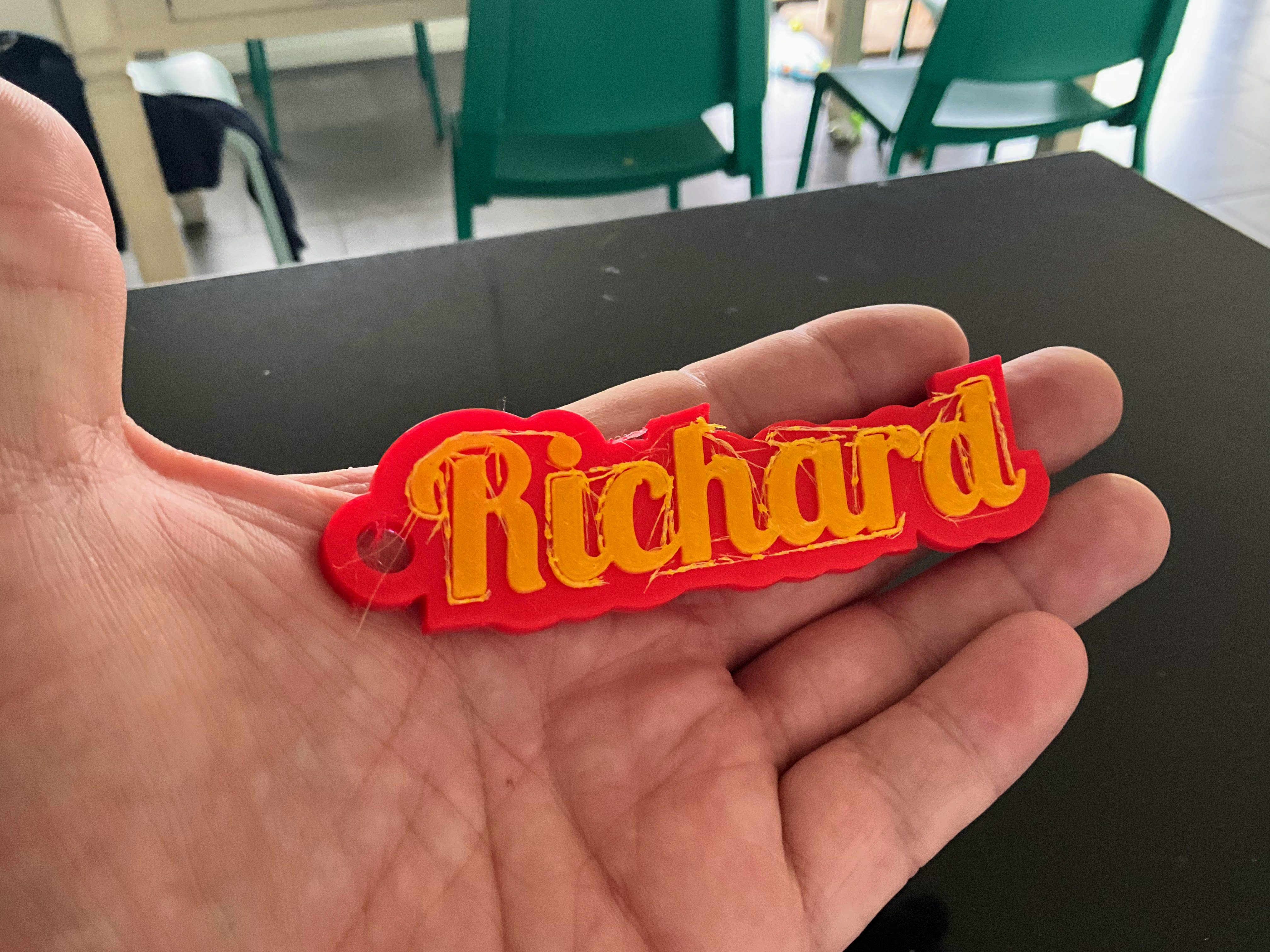 3D Printed Keychain with heavy stringing