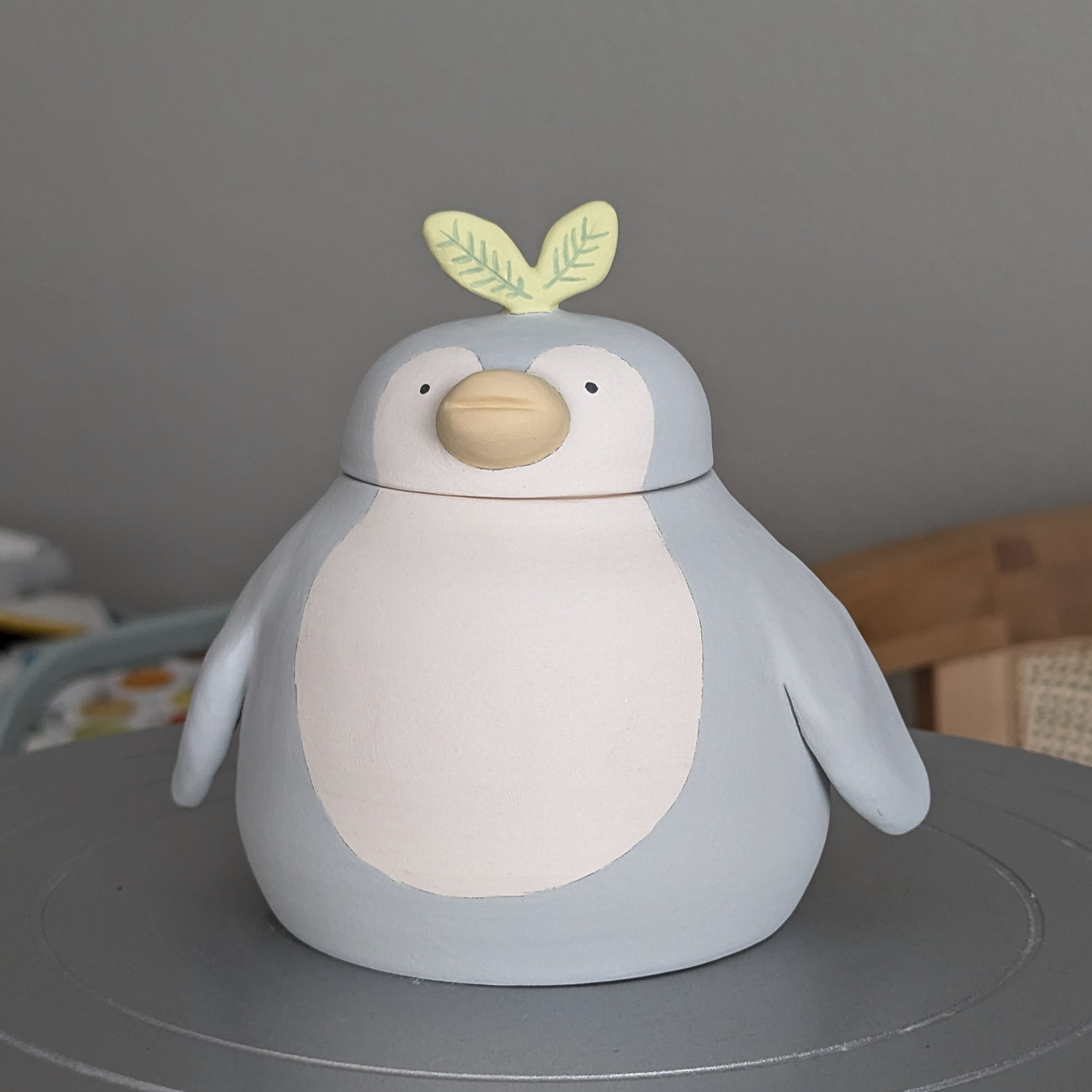 Large blue penguin painted