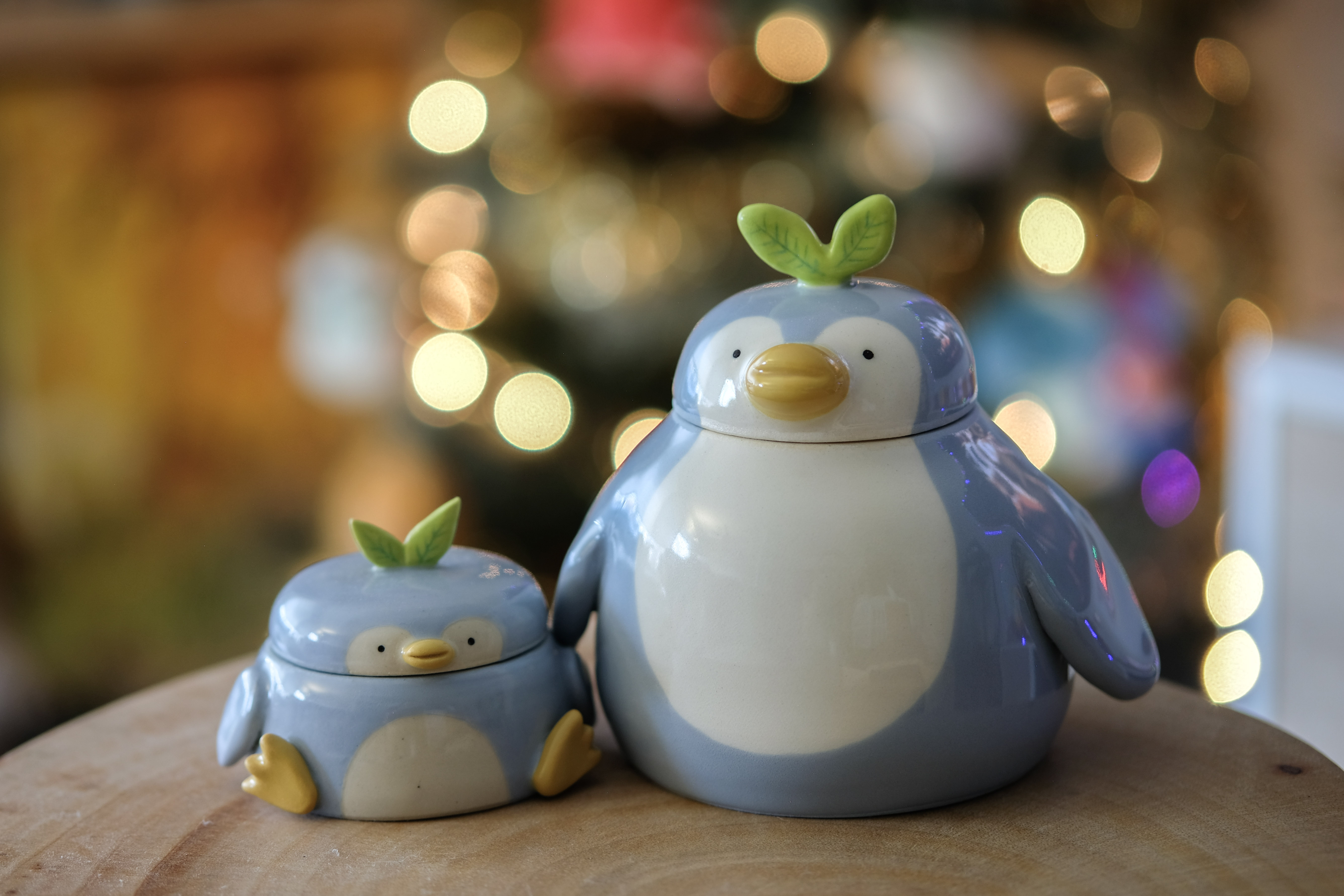 Large blue penguin with small