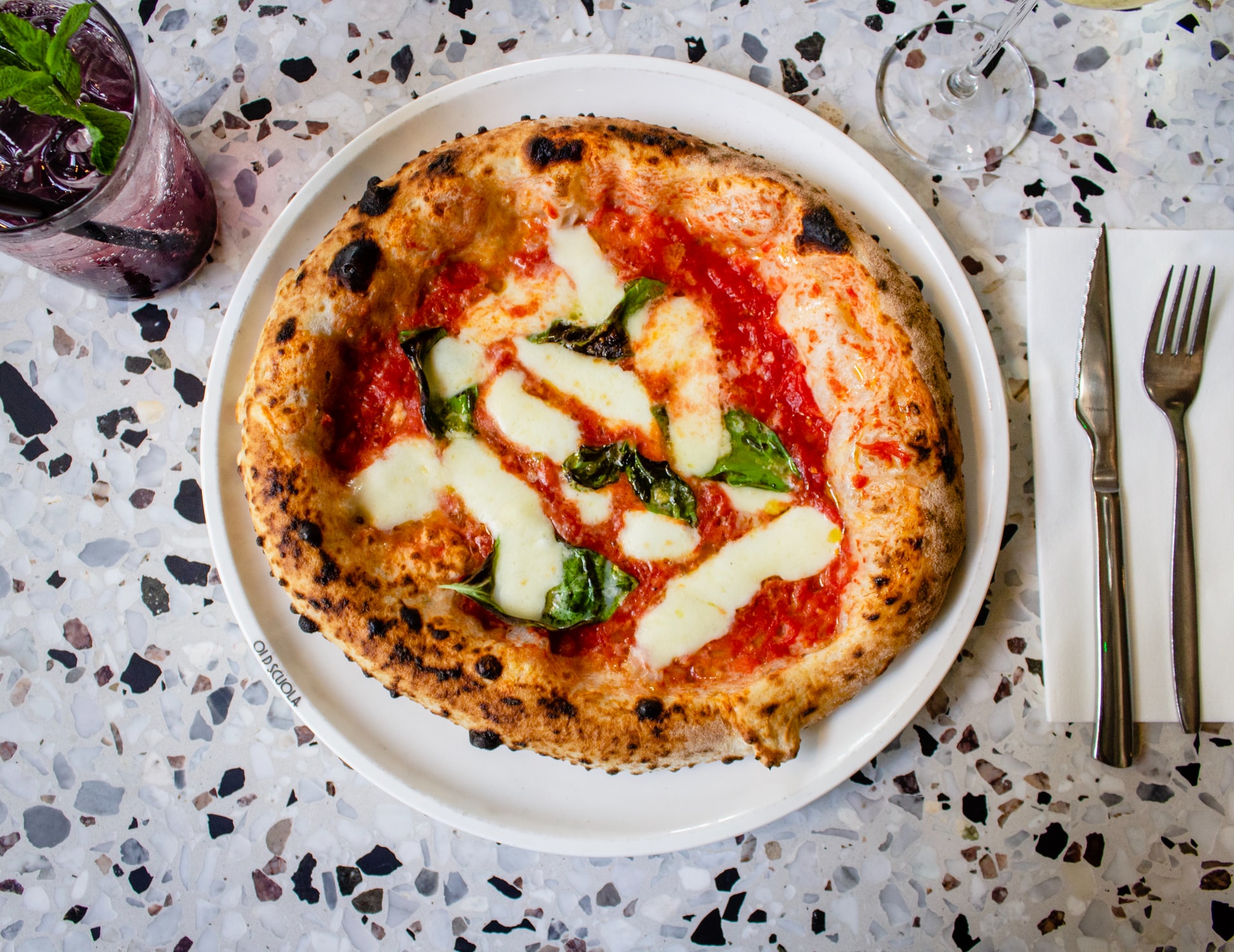 An appealing, cheesy authentic Naples pizza