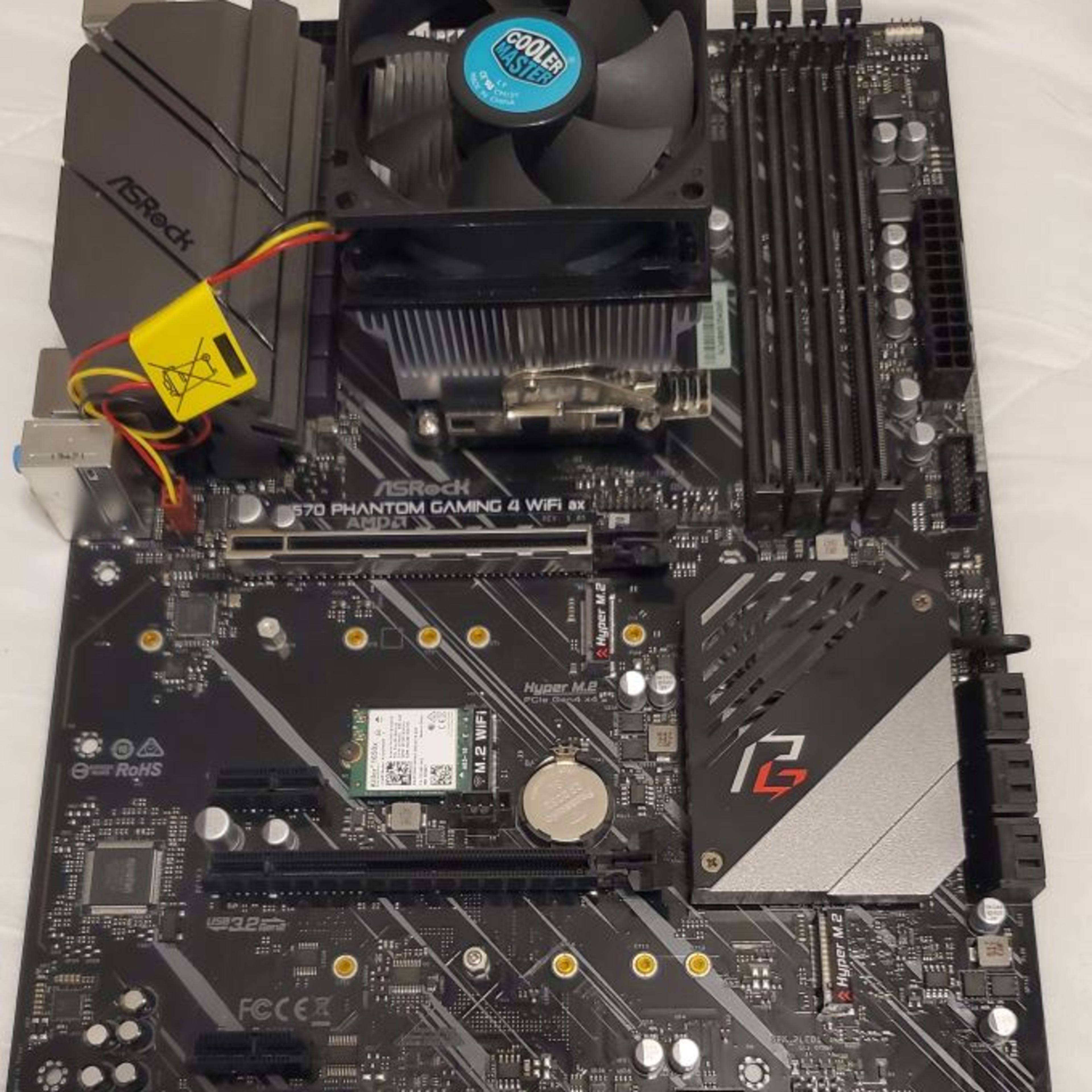 Pre-owned Combo AMD Ryzen 9 5900X CPU, ASRock X570 PHANTOM GAMING 4 WIFI AX MOTHERBOARD and Cooler