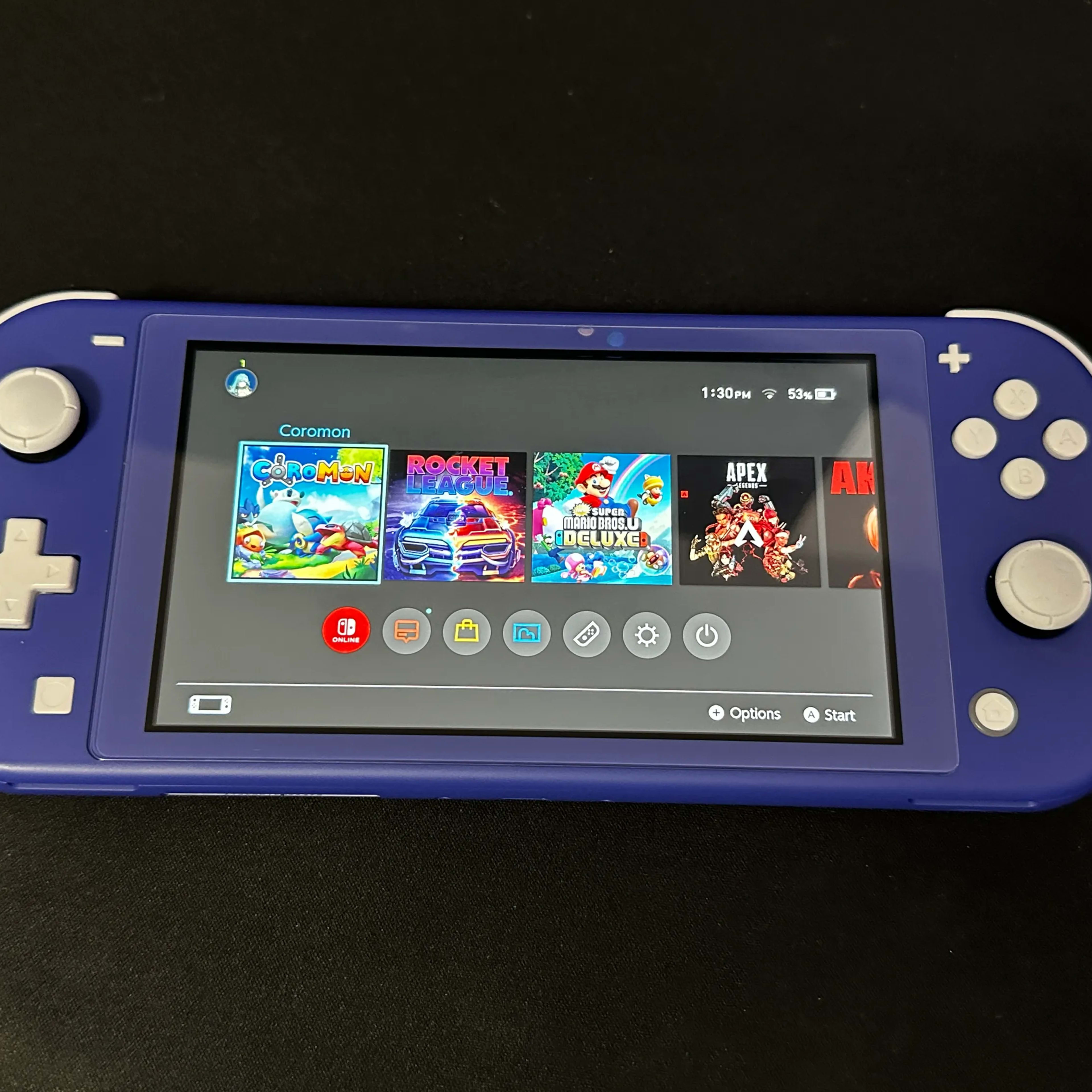 Nintendo Switch Lite 32GB (Blue) BUNDLE (Case + 5 Games Nintendo Switch Lite 32GB (Blue) BUNDLE (Case + 5 Games