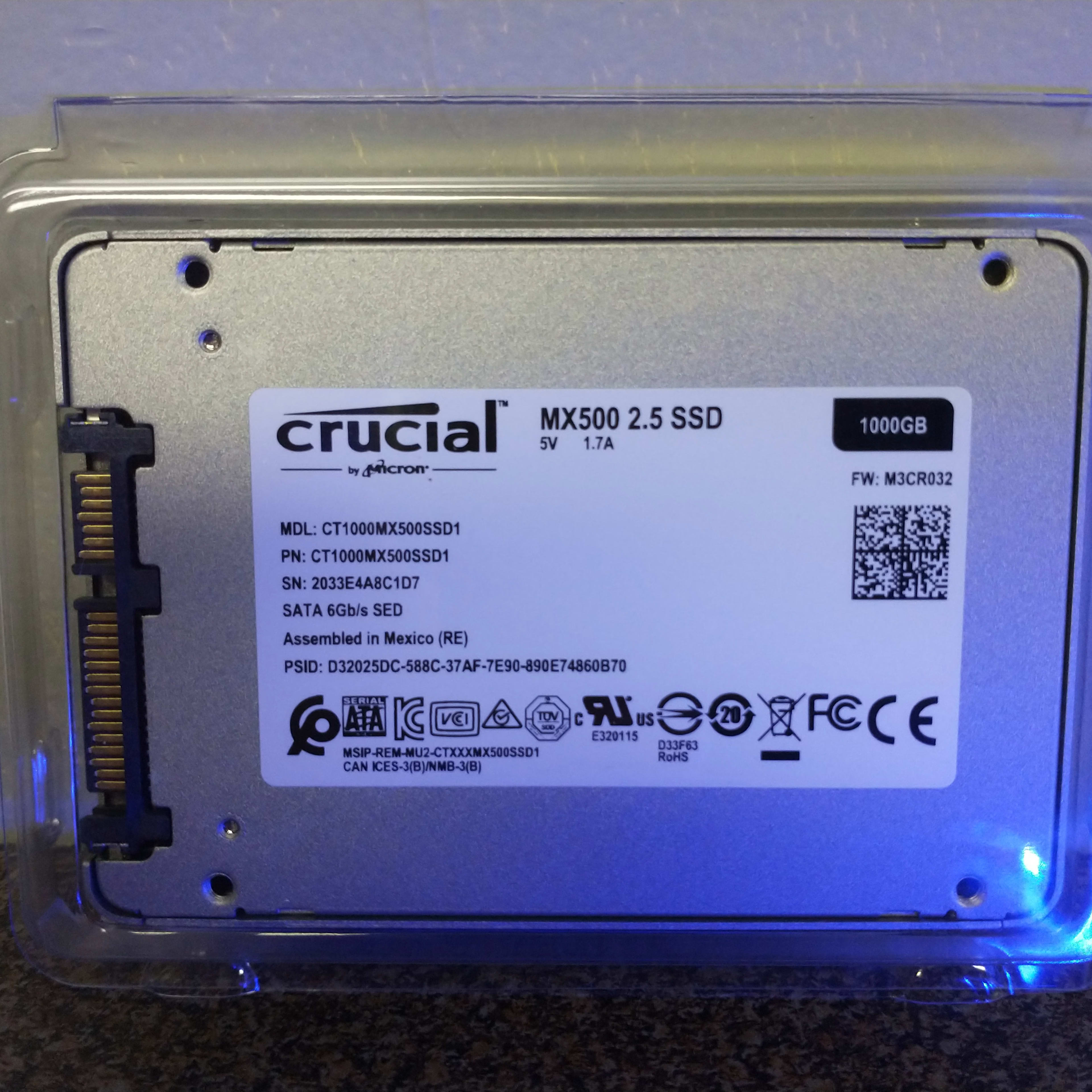 Brand-new 1TB Crucial MX500 with 9.5mm shim in OEM packaging