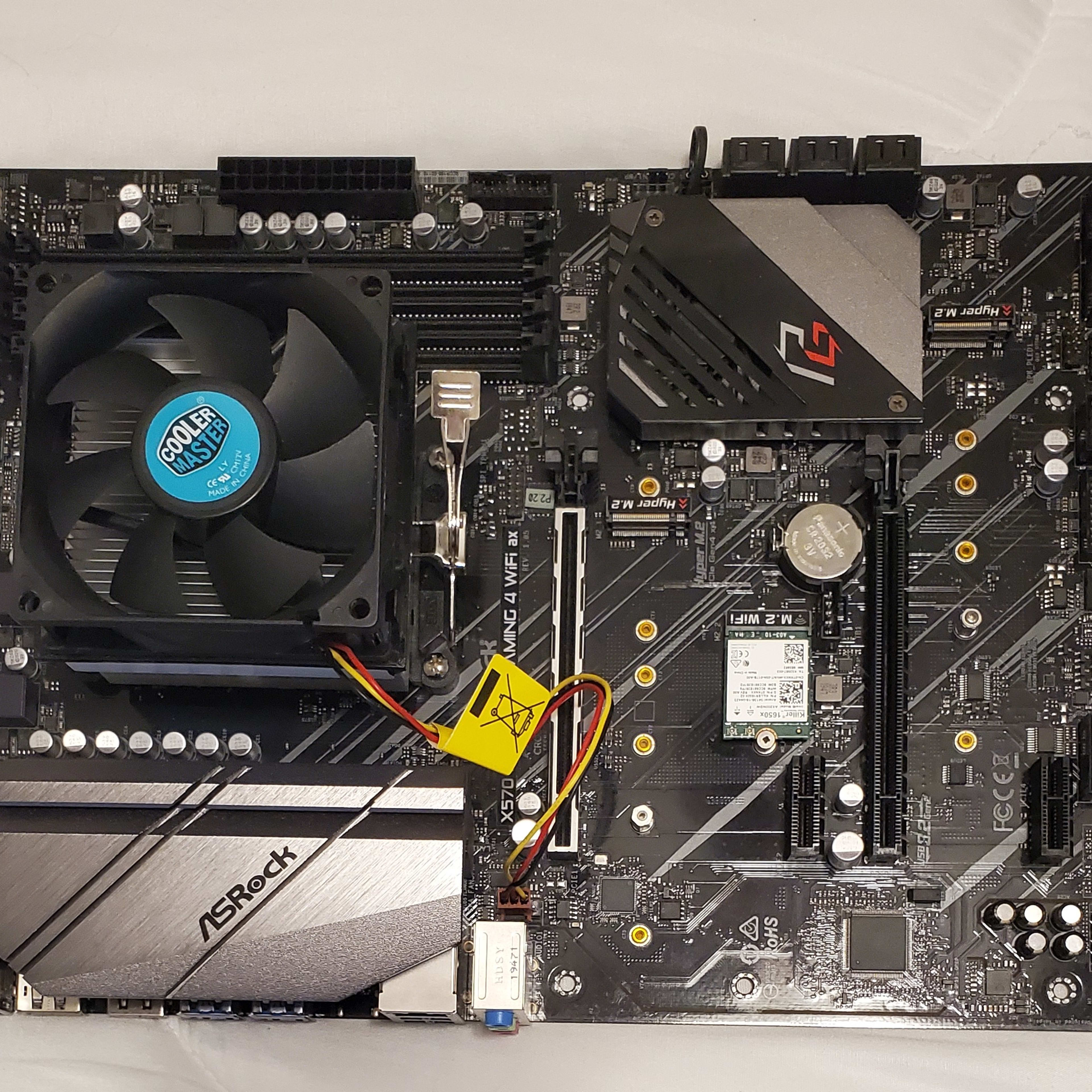 Pre-owned Combo AMD Ryzen 9 5900X CPU, ASRock X570 PHANTOM GAMING 4 WIFI AX MOTHERBOARD and Cooler