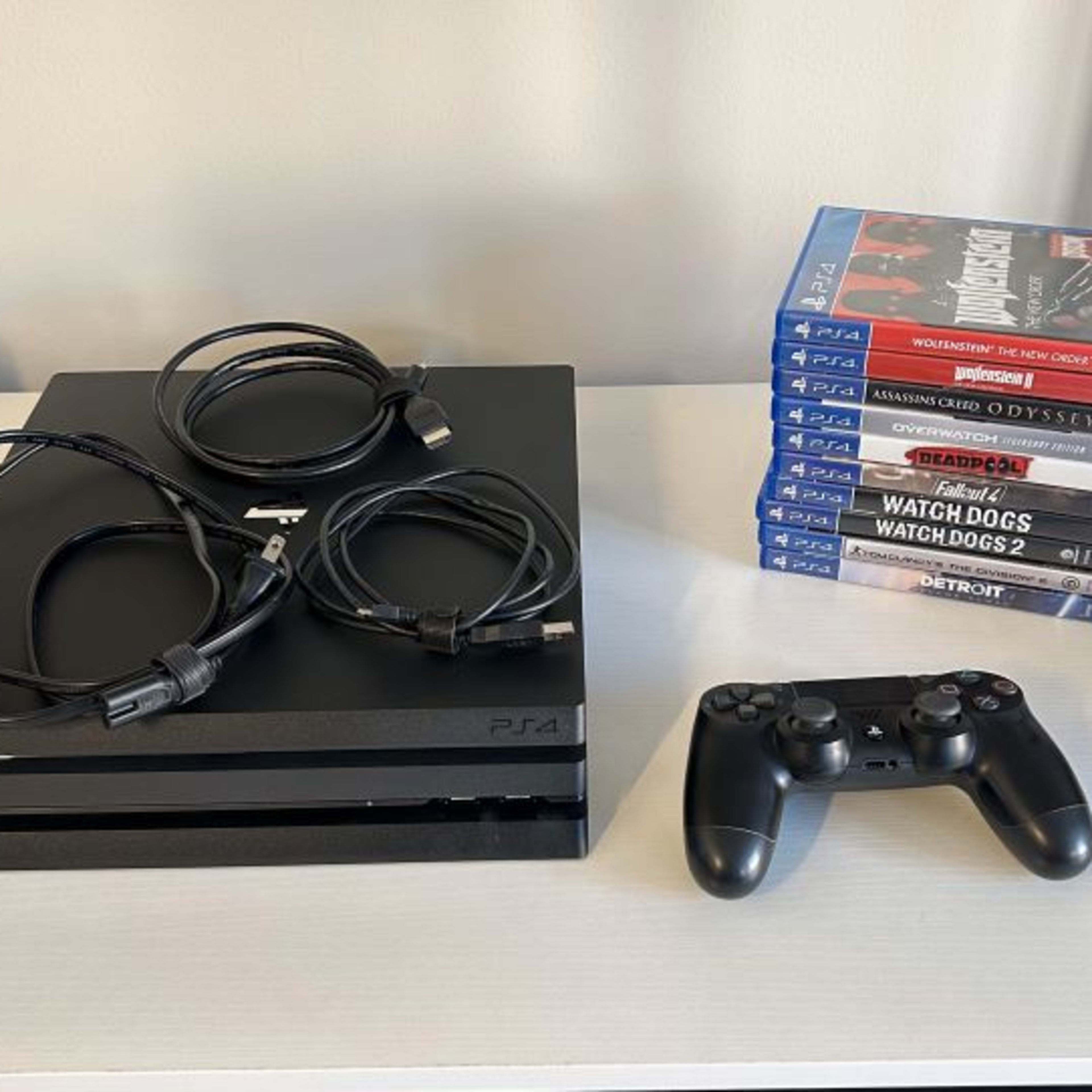 PS4 Pro (1 TB) - 10 Games Included (See Product Description for Titles)