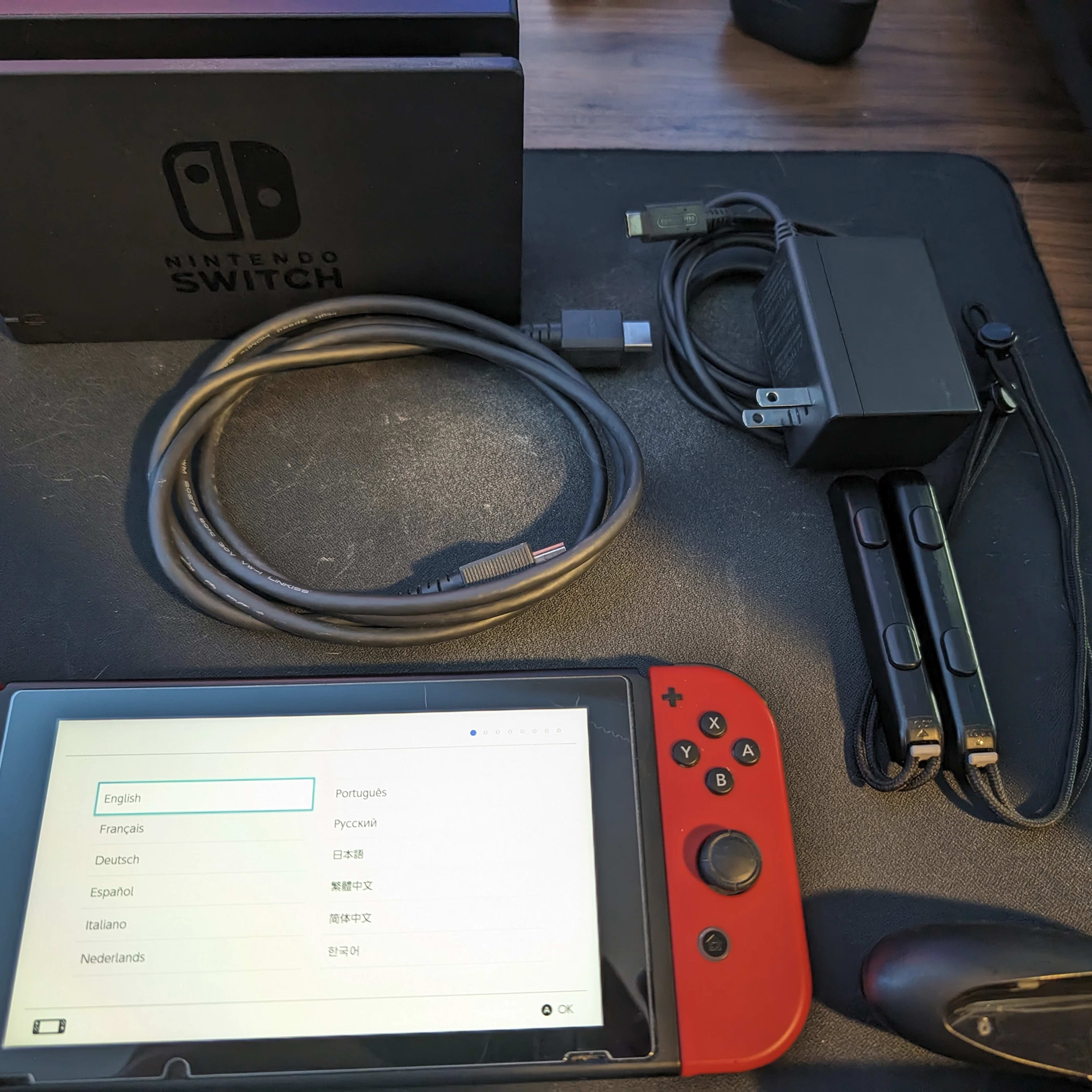 Nintendo Switch 32GB - All Original Accessories + Mario Red Joy Con Pair