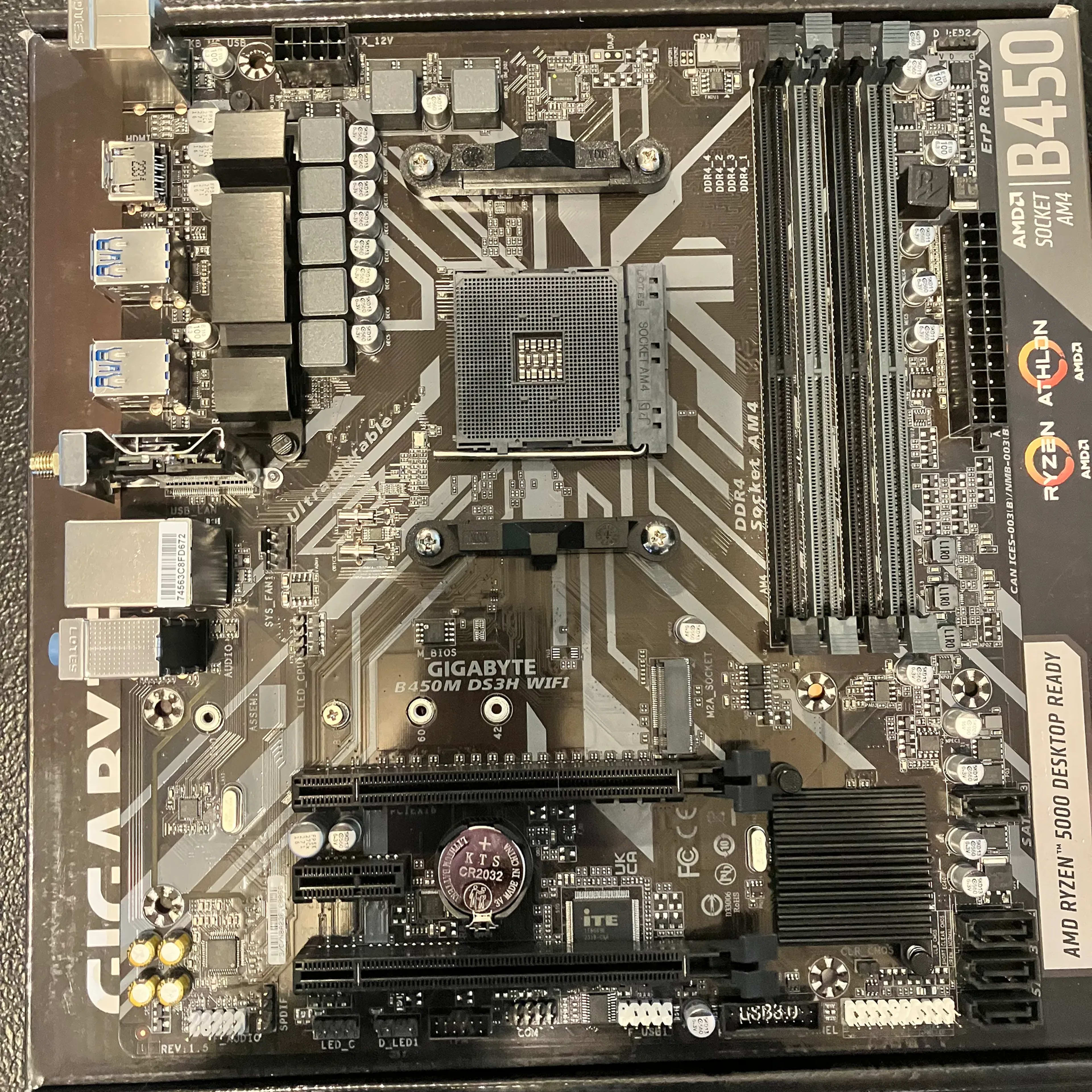 Open Box: Gigabyte B450M DS3H Wi-Fi Micro ATX AM4 DDR4 Motherboard W/ IO shield.