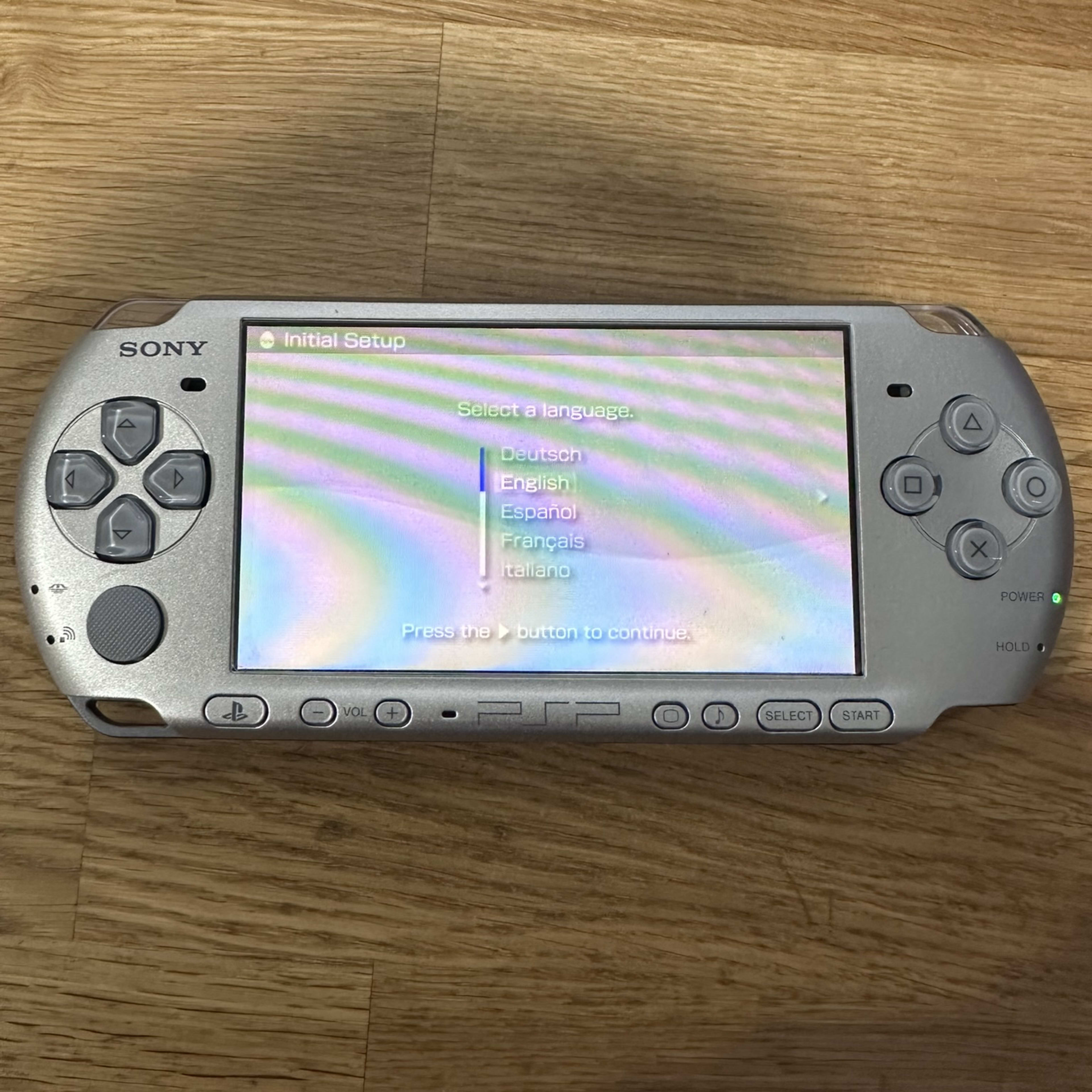 Sony PSP-3000 Handheld System Silver, Includes Charger