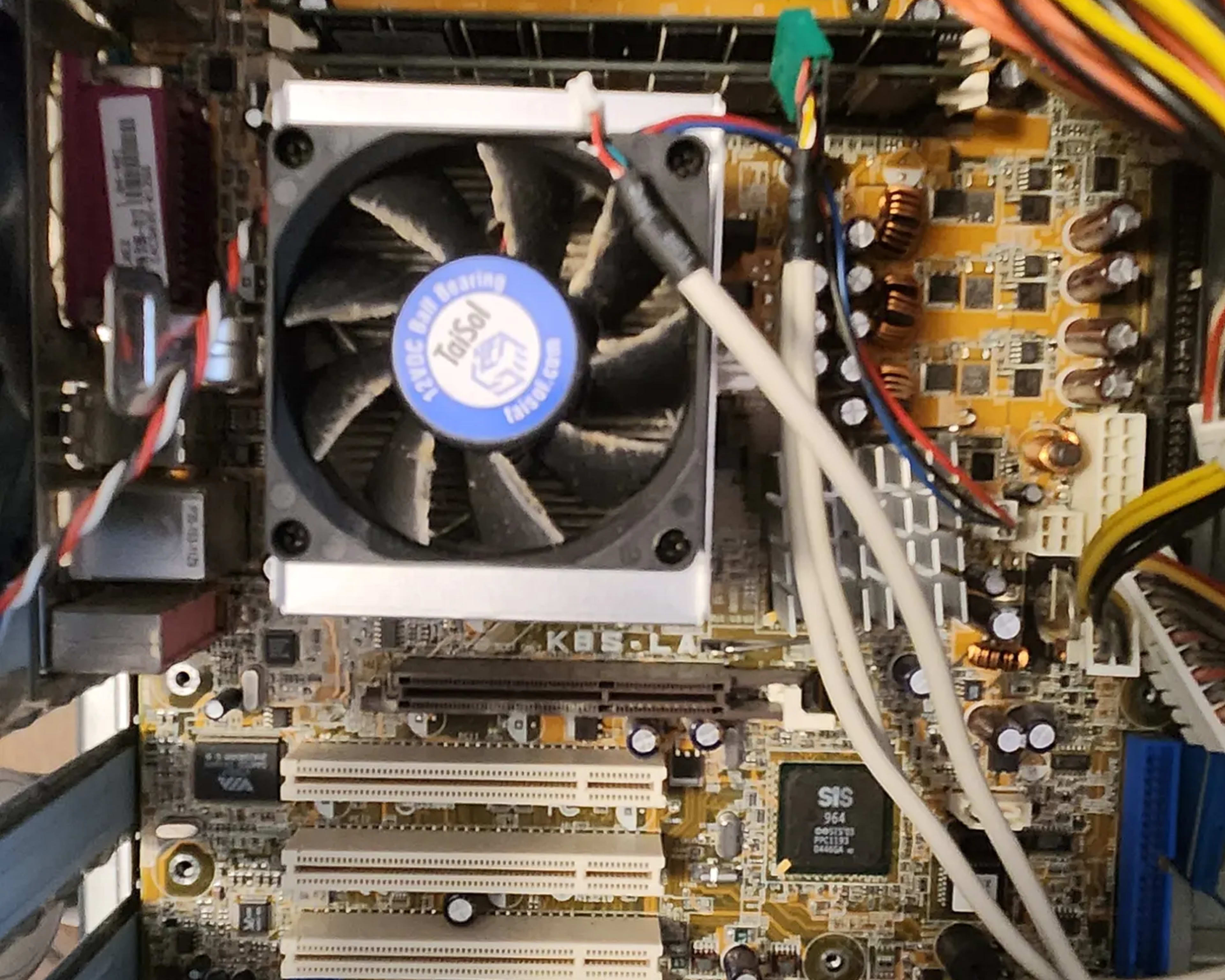 Prehistoric amd athlon 64 asus motherboard ram combo with a nvidia fx 5500 and a miscellaneous card
